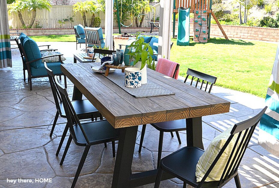 outdoor dining room with teak table