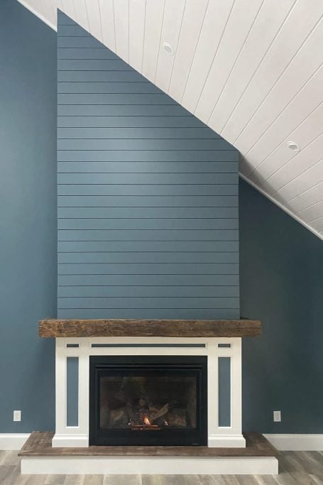 blue shiplap fireplace vaulted ceiling